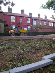 Grapes Hill Community Garden - Stone edging in place