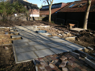 Grapes Hill Community Garden - Yorkstone paving slabs have been cemented in
