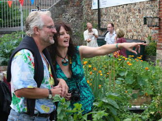 Jo showing Will Giles around the garden