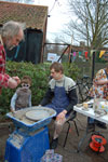 At the potter's wheel