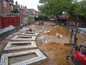 Grapes Hill Community Garden - Putting in raised bed foundations and granite setts