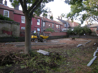 Grapes Hill Community Garden - Stone edging in place