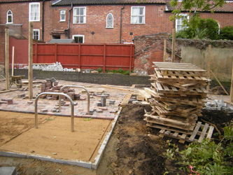 Grapes Hill Community Garden - Bike rack and pallets